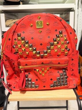 MCM Red Studded Logo Backpack with Gold & Silver Studs